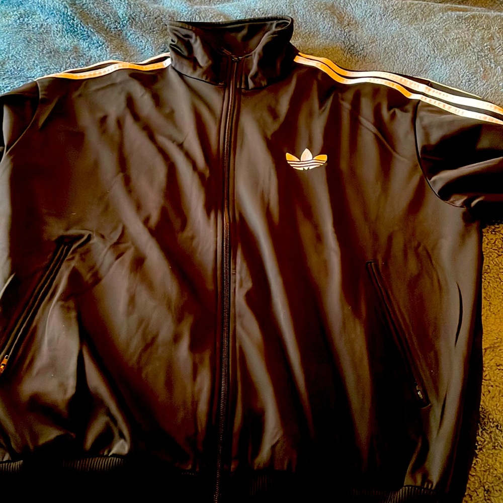 New no tags, but never worn or washed Adidas jacket